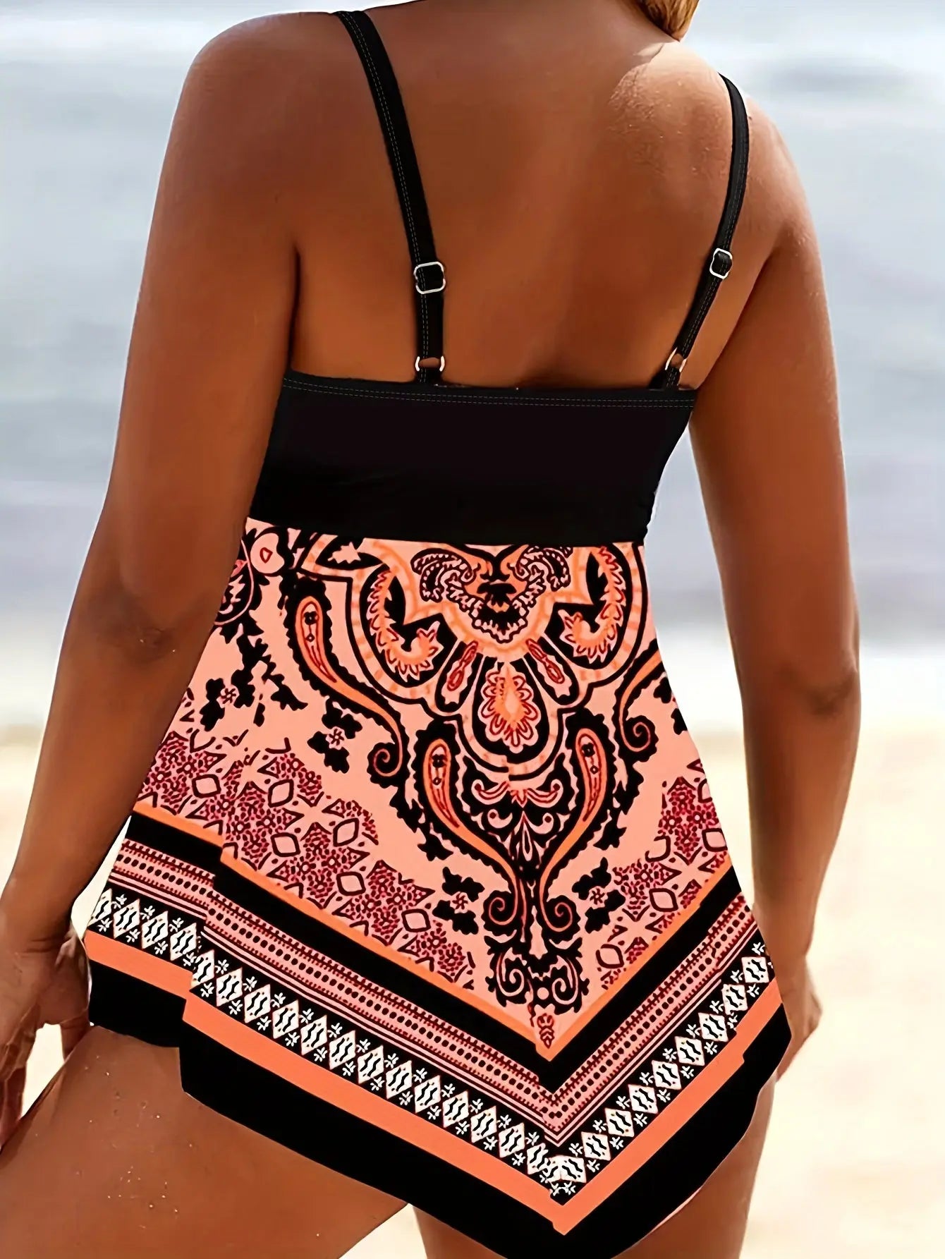 https://alittledisandat.com › products › 2-piece-tribal-print-tankini-set-for-women-flattering-v-neck-with-handkerchief-hem-and-high-cut-bottoms-perfect-for-beachwear-and-summertime-swimming1715176231314 image3