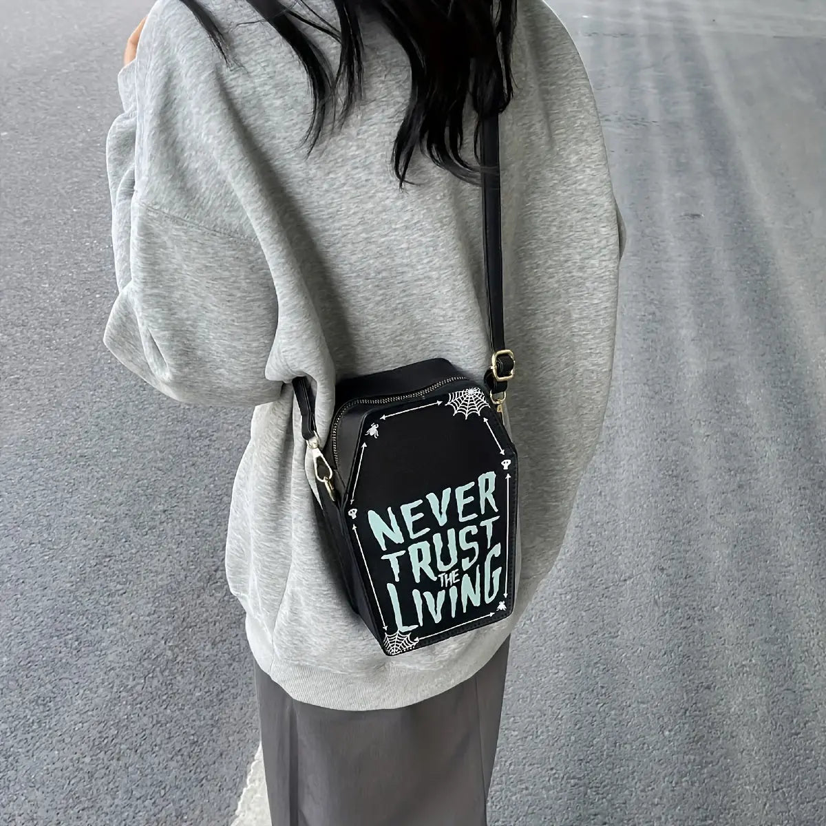 https://alittledisandat.com › products › gothic-coffin-crossbody-bag-with-slogan-and-spider-web-pattern1726409739426 image5