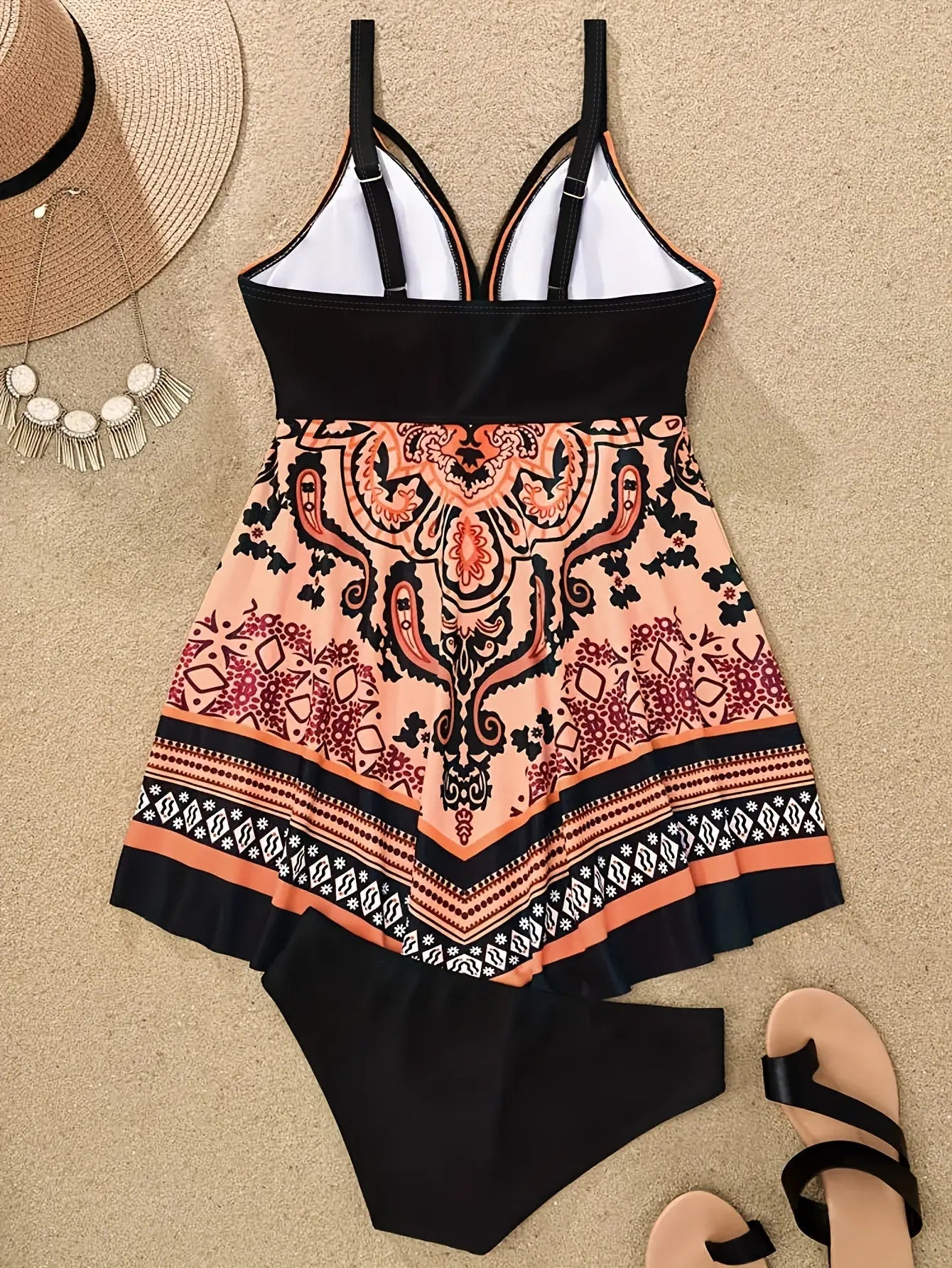 https://alittledisandat.com › products › 2-piece-tribal-print-tankini-set-for-women-flattering-v-neck-with-handkerchief-hem-and-high-cut-bottoms-perfect-for-beachwear-and-summertime-swimming1715176231314 image4