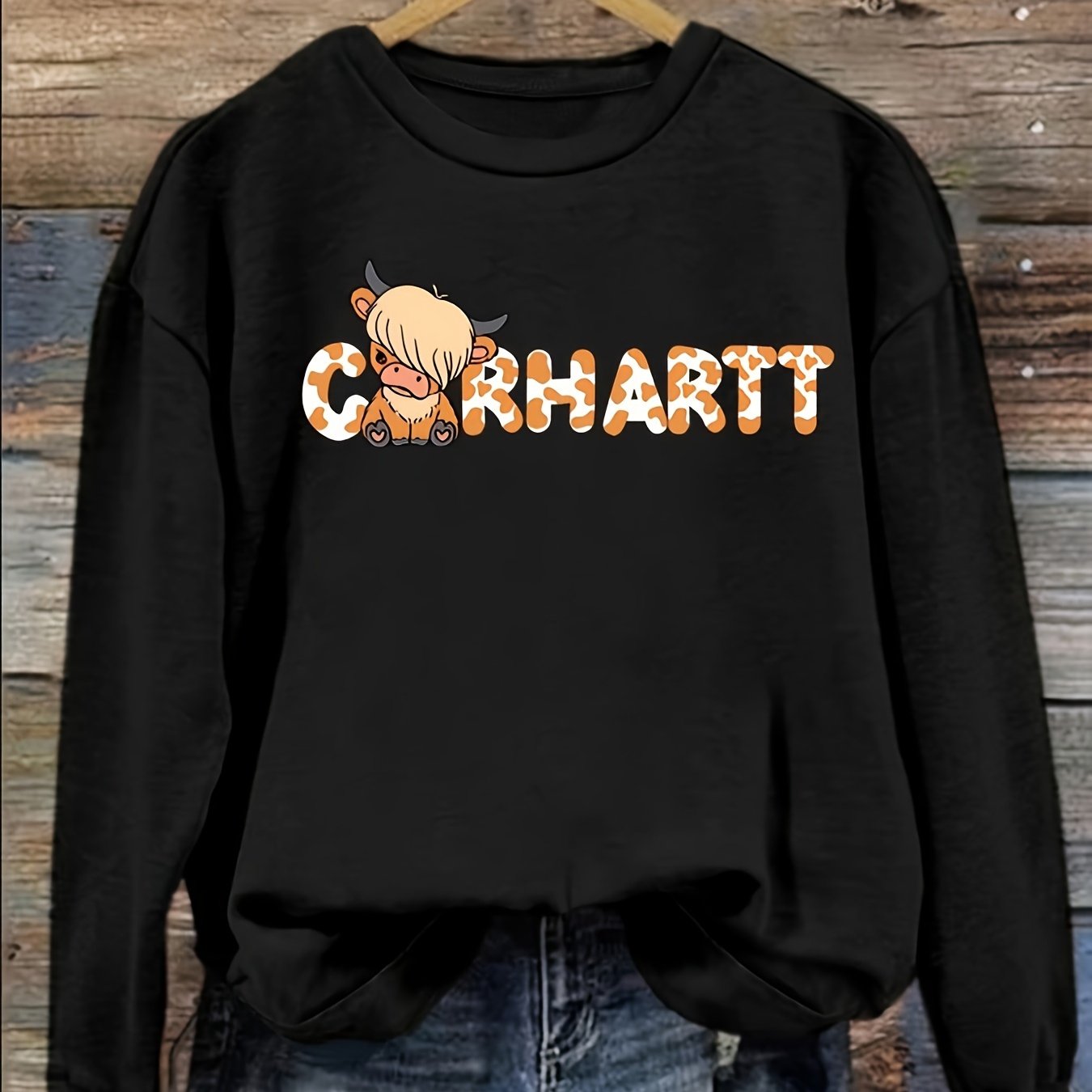 https://alittledisandat.com › products › chic-warm-cow-letter-print-womens-sweatshirt1722629272813 variants11