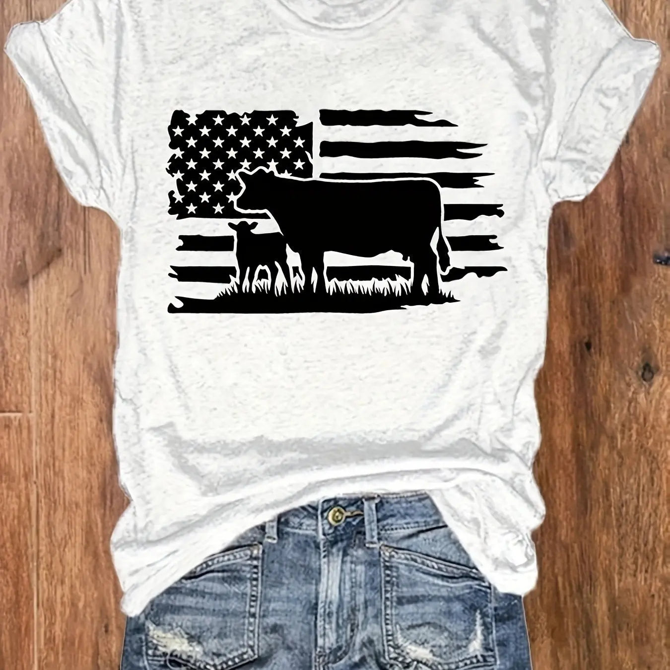 https://alittledisandat.com › products › vibrant-american-flag-cattle-print-womens-tshirt1725643557849 variants10