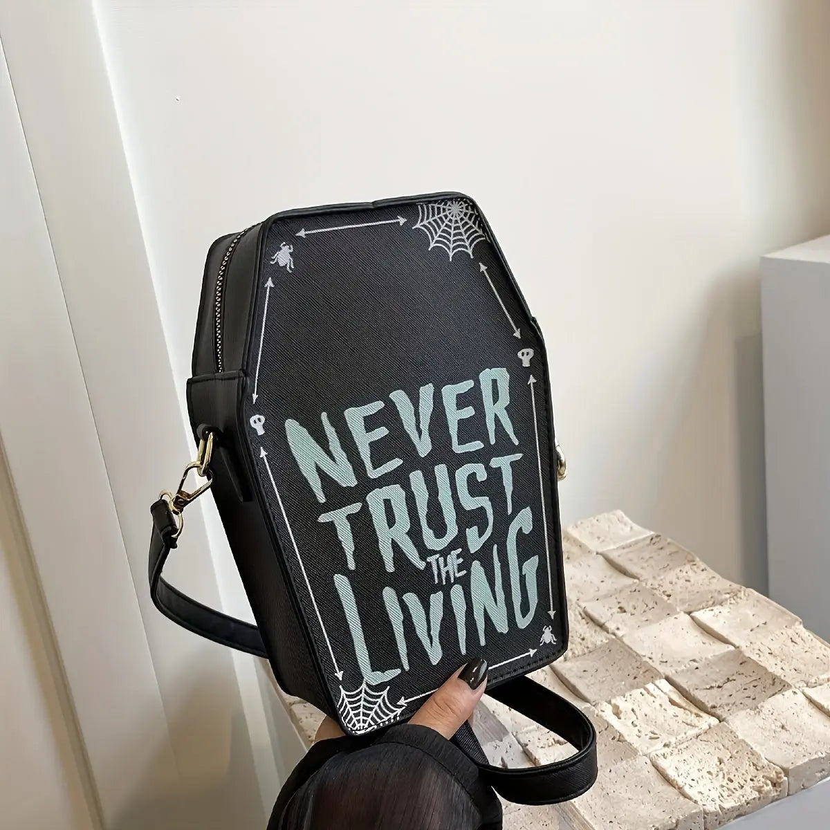 https://alittledisandat.com › products › gothic-coffin-crossbody-bag-with-slogan-and-spider-web-pattern1726409739426 image3