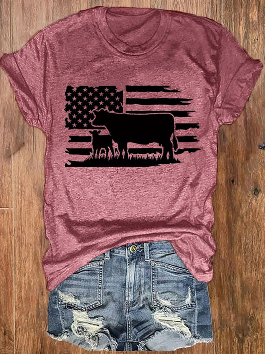 https://alittledisandat.com › products › vibrant-american-flag-cattle-print-womens-tshirt1725643557849 image0